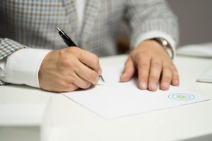 hand and a document